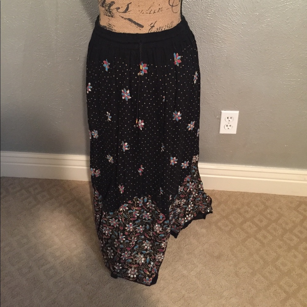 Earthbound long skirt with sequin details.